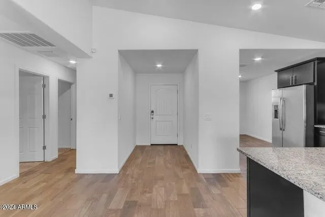 a kitchen with a sink stove and microwave