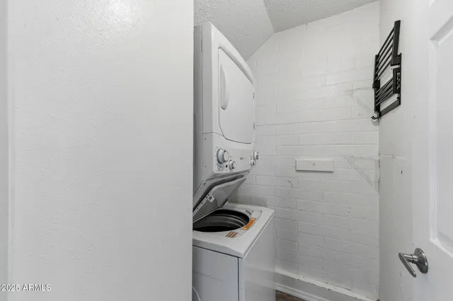 a bathroom with a sink a toilet and vanity