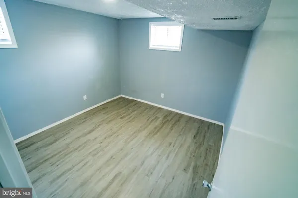 an empty room with a workbench