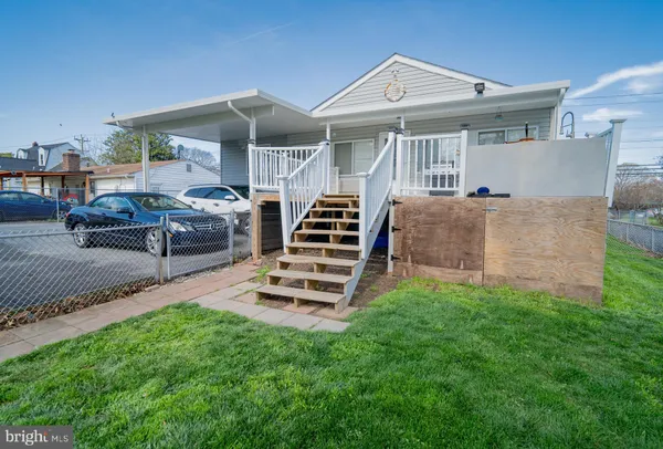 a front view of a house with garage