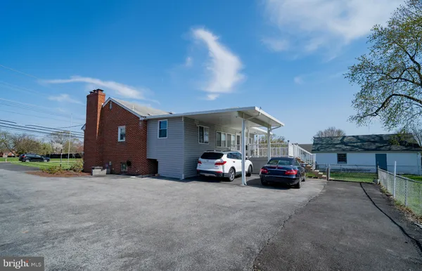 a car parked in front of a house