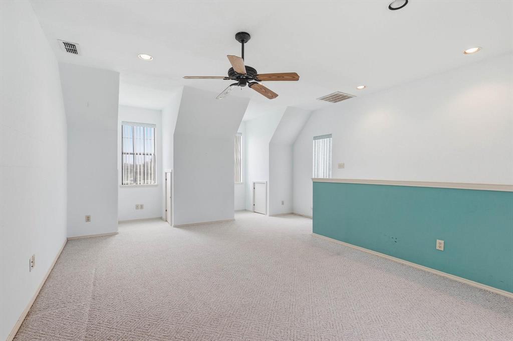 211 Bayne Road Haslet, TX 76052 - Photo 18 of 29 a view of an empty room with a window