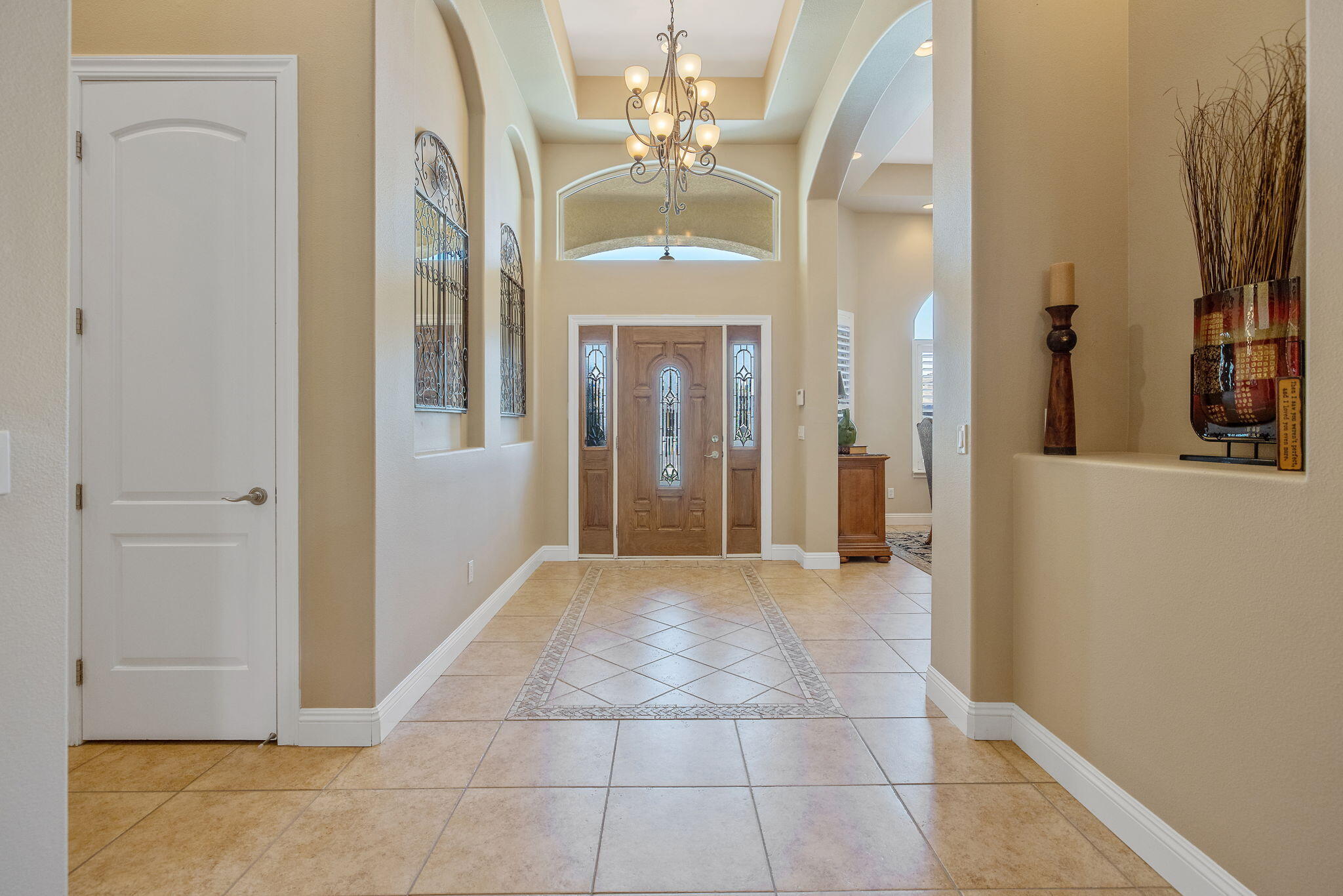760 St James Court Exeter, CA 93221 - Photo 42 of 77 front door and primary bedroom west hallway.