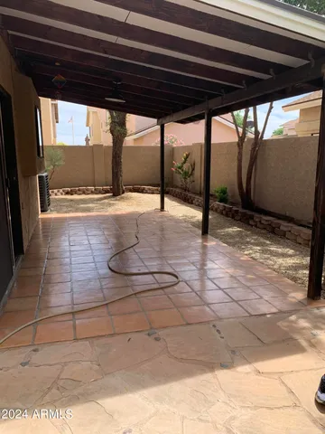 a view of a backyard of the house