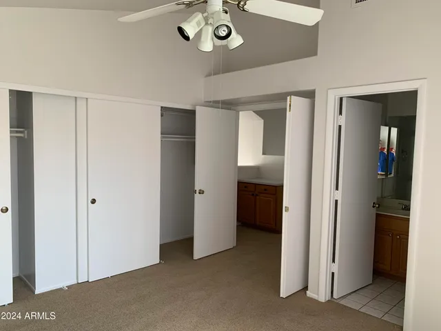 a view of an entryway with a cabinet