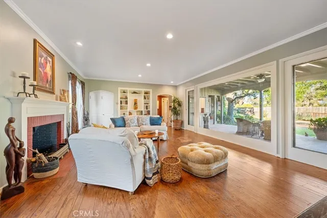 a kitchen with a stove a sink dishwasher and a refrigerator