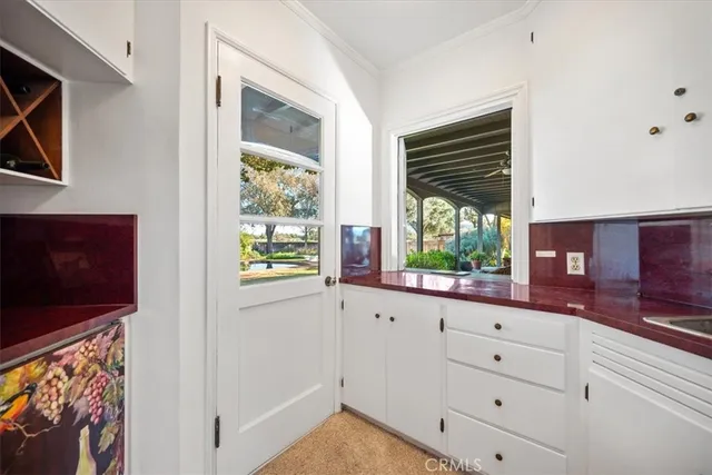 a bed room with a bed and a television