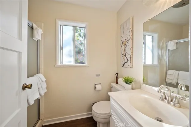a view of a house with a porch and furniture