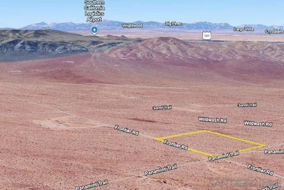 0 Panamint Trail, Unit 29 Helendale, CA 92342 - Photo 33 of 37 a view of a dry yard with wooden fence