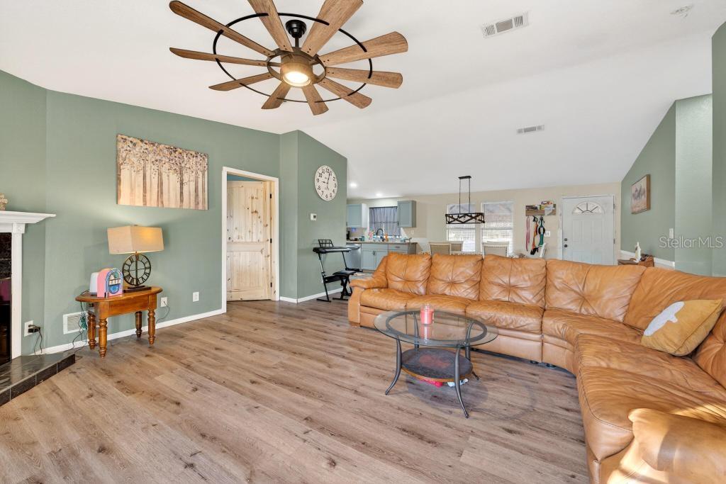 40100 Jim Scotts Road Leesburg, FL 34788 - Photo 14 of 40 a living room with furniture