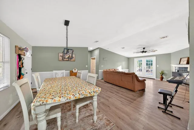 a living room with furniture and a table