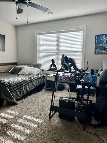 a bed room with furniture