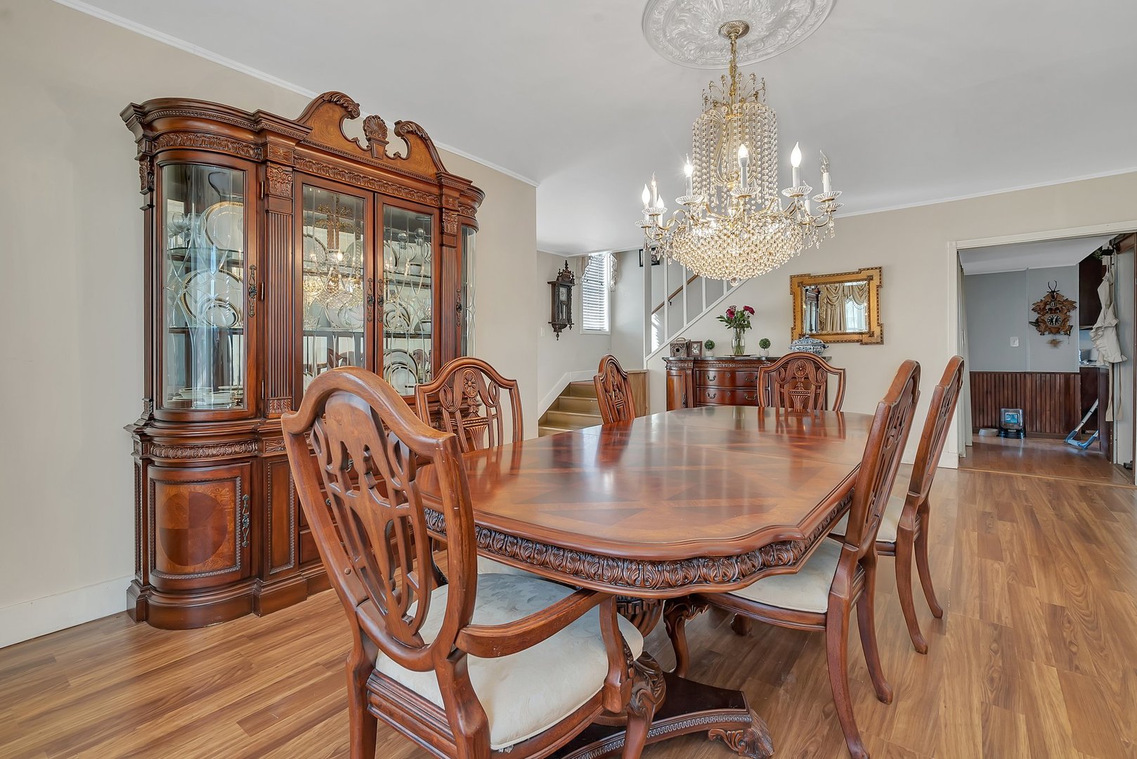 401 7th Street Mazon, IL 60444 - Photo 7 of 26 a view of a dining room with furniture a chandelier and wooden floor
