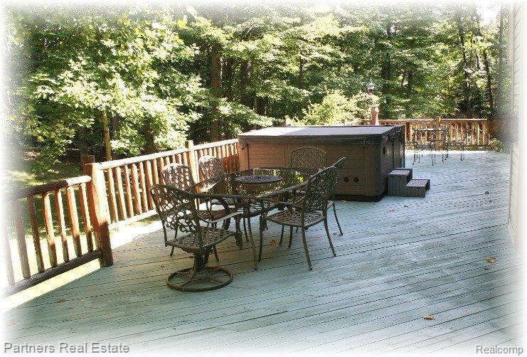 2541 Spruce Ridge Howell, MI 48855 - Photo 20 of 24 Deck with HotTub_ViewSouth