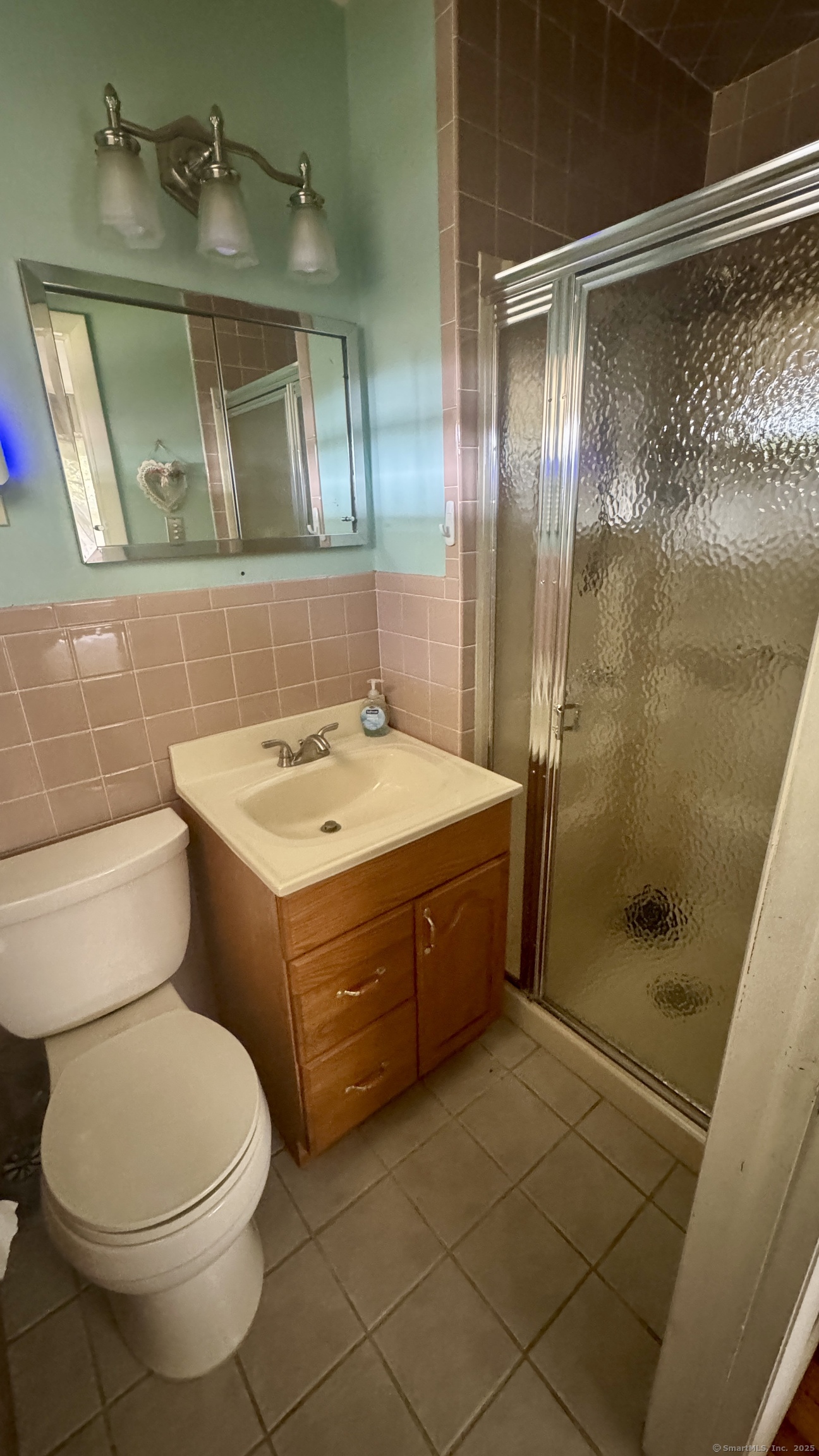 30 Mountain Road Danbury, CT 06810 - Photo 21 of 35 a bathroom with a sink a toilet and shower