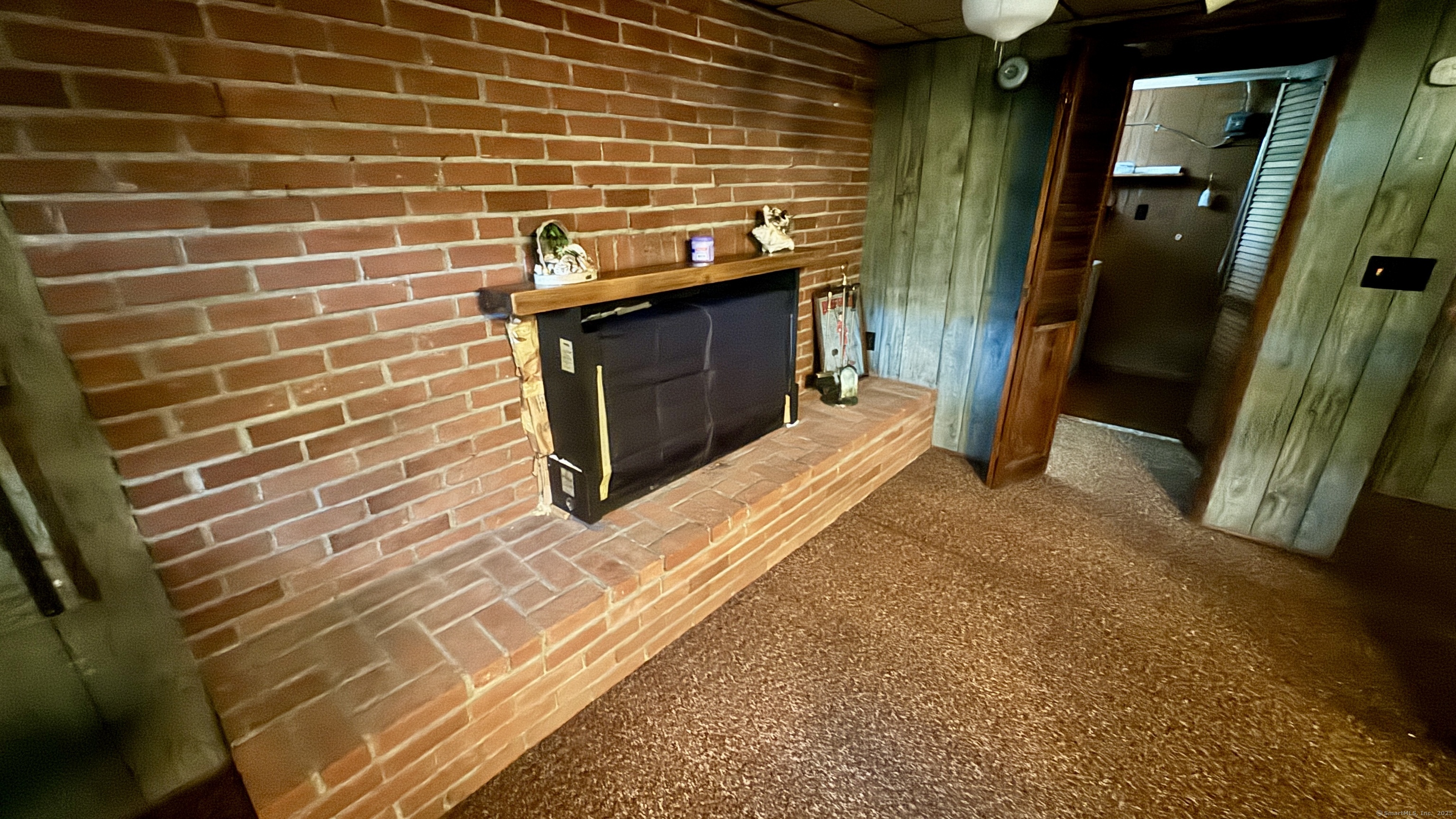 30 Mountain Road Danbury, CT 06810 - Photo 23 of 35 a view of a fireplace