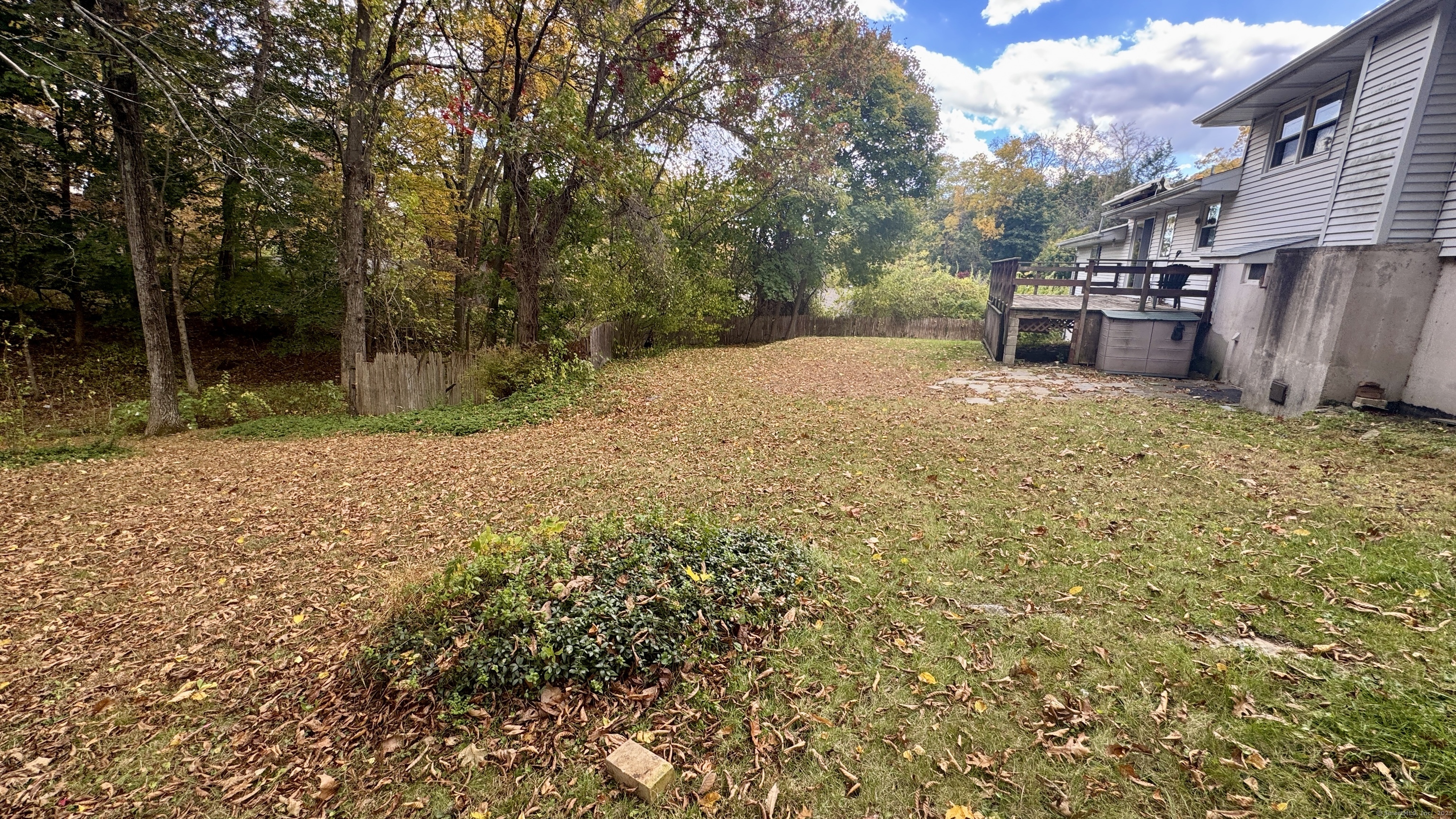 30 Mountain Road Danbury, CT 06810 - Photo 3 of 35 a backyard of a house with table and chairs