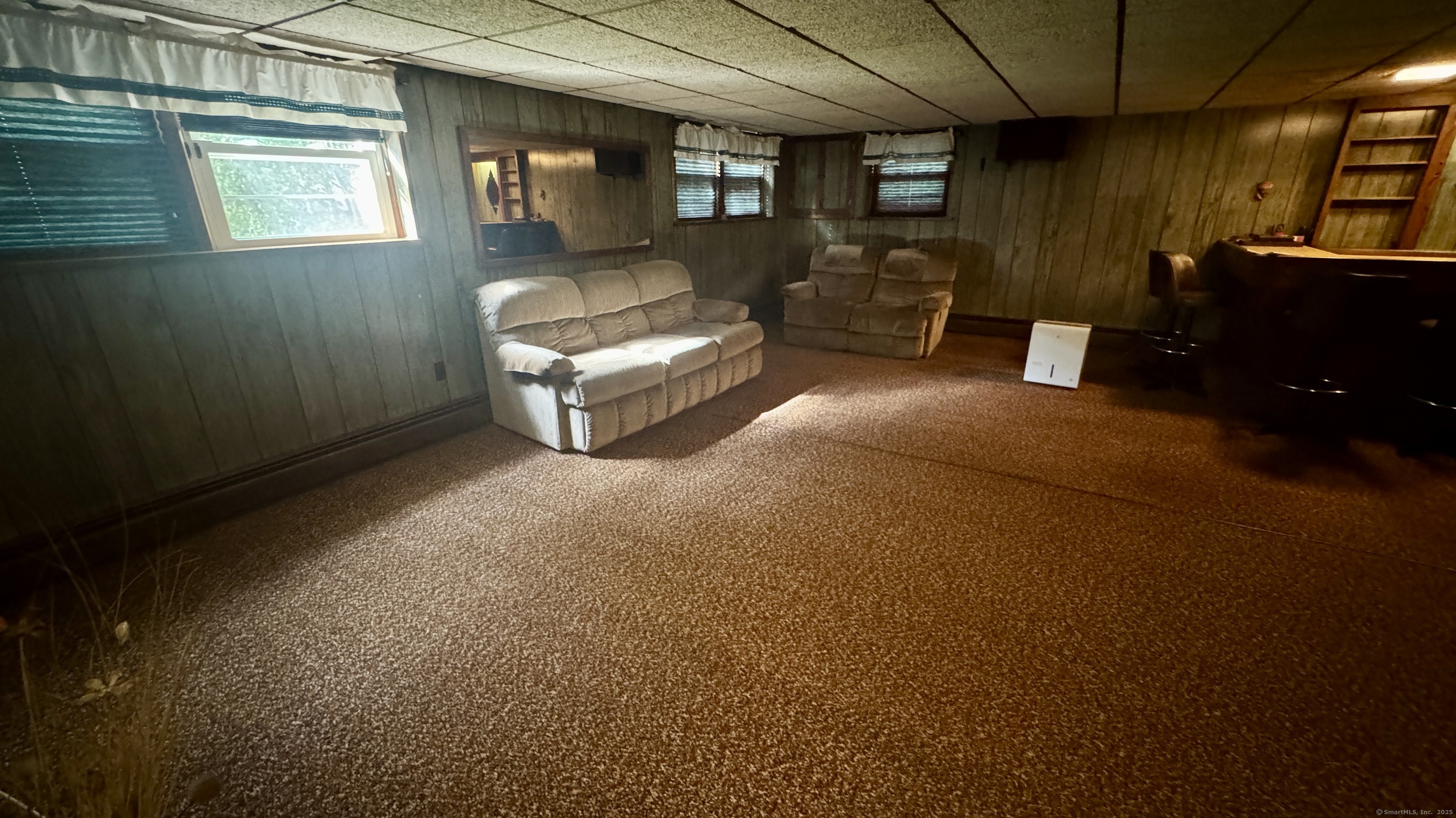 30 Mountain Road Danbury, CT 06810 - Photo 31 of 35 a living room with furniture and a window
