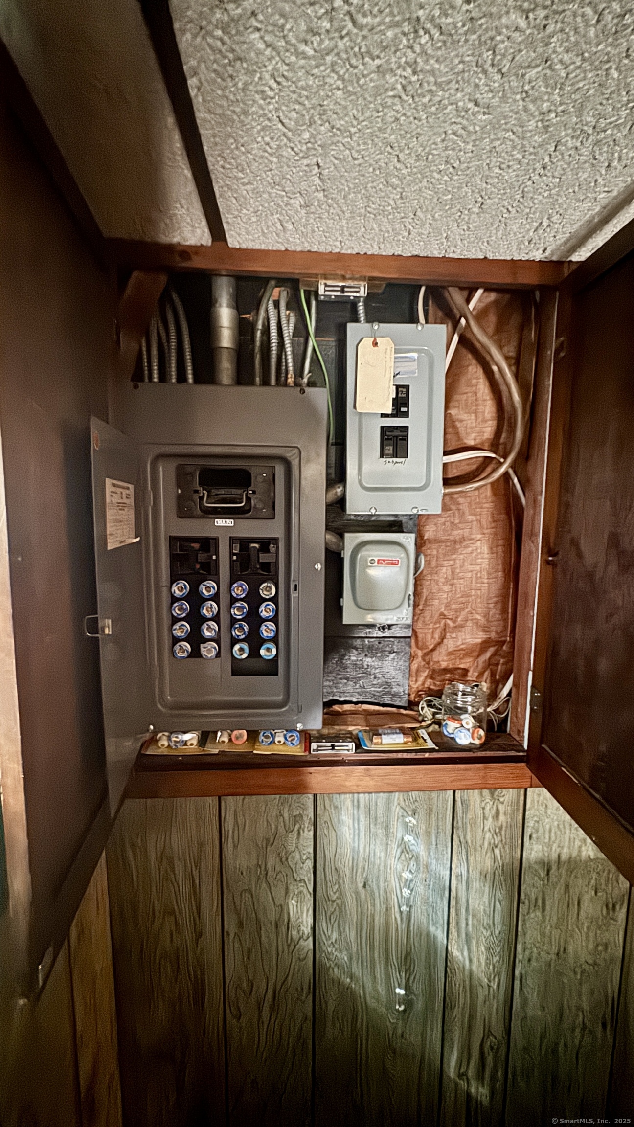 30 Mountain Road Danbury, CT 06810 - Photo 34 of 35 a view of water heater and wooden floor