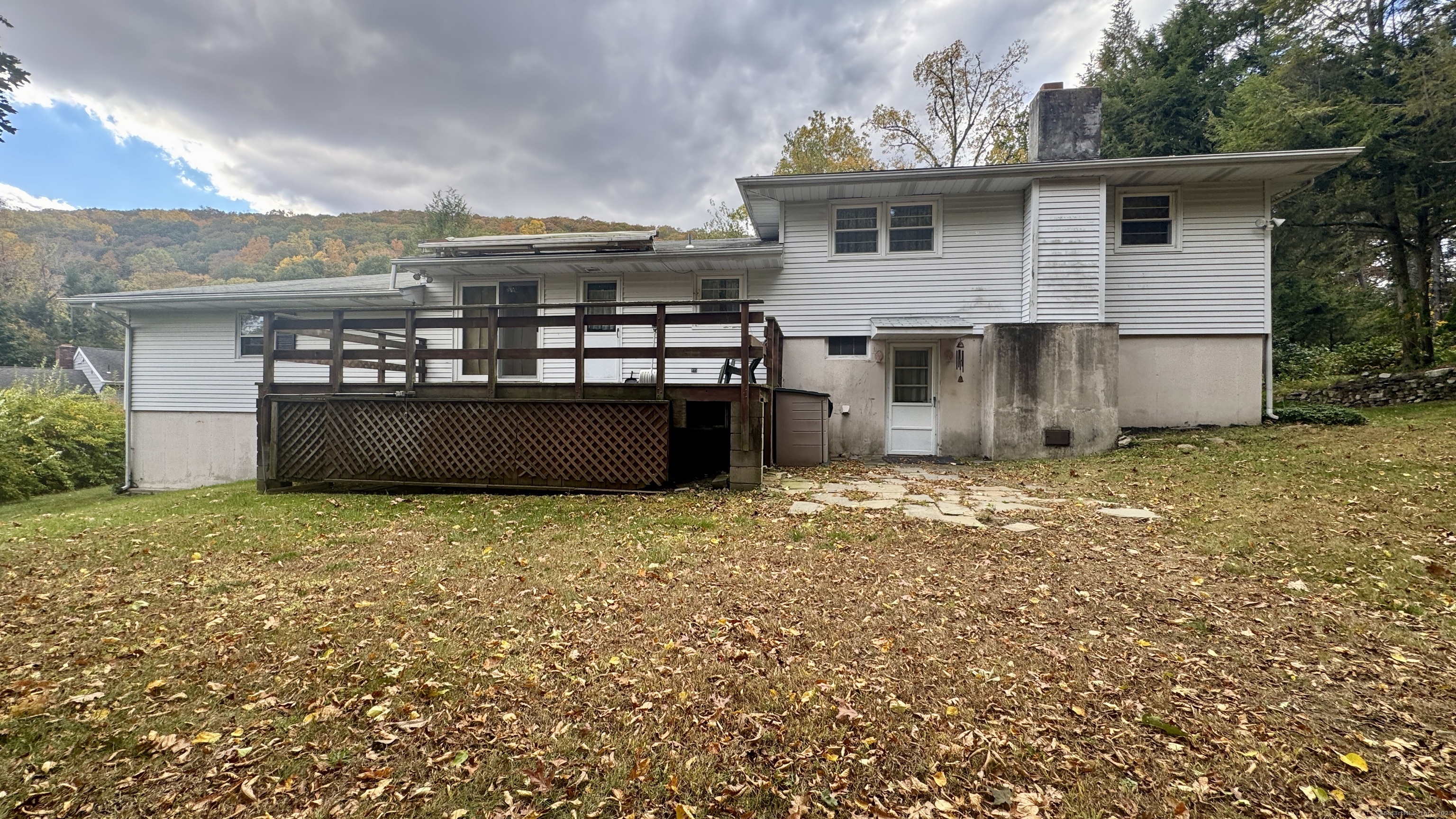 30 Mountain Road Danbury, CT 06810 - Photo 4 of 35 a view of a house with a backyard