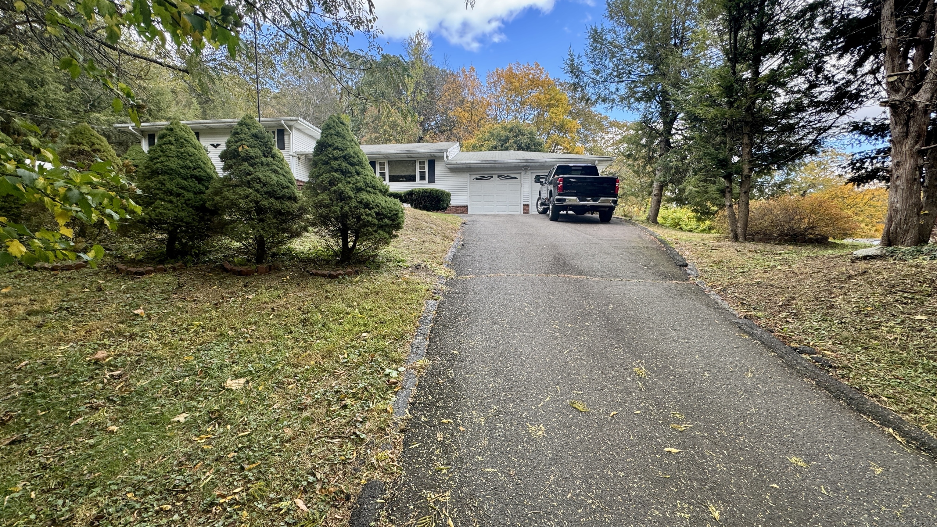 30 Mountain Road Danbury, CT 06810 - Photo 8 of 35 a view of a yard with plants