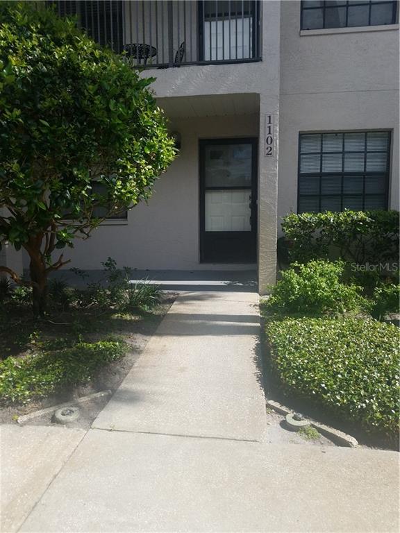 2188 Elm Street, Unit 1102 Dunedin, FL 34698 - Photo 1 of 1 front view of a house