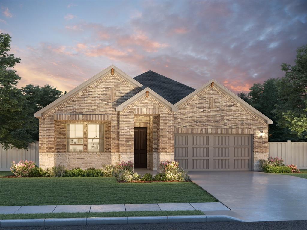 2452 Flatiron Drive Corinth, TX 76210 - Photo 1 of 2 a front view of a house with a garden