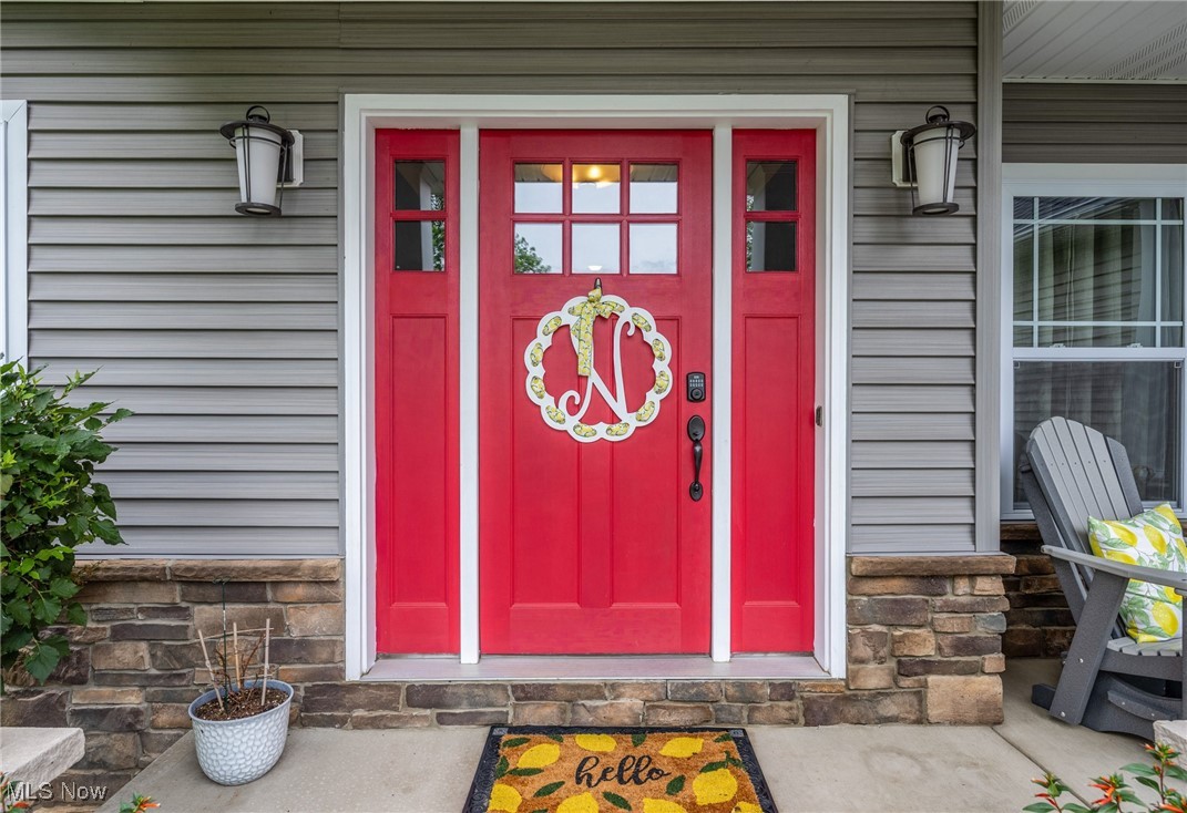 2851 Barnett Ridge Road Fleming, OH 45729 - Photo 39 of 40 Doorway to property with stone and vinyl siding