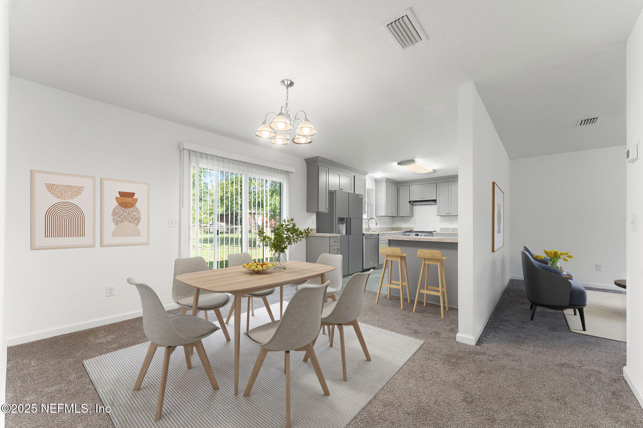 4906 Chivalry Drive Jacksonville, FL 32208 - Photo 8 of 17 Kitchen and Dinning Room - staged photo