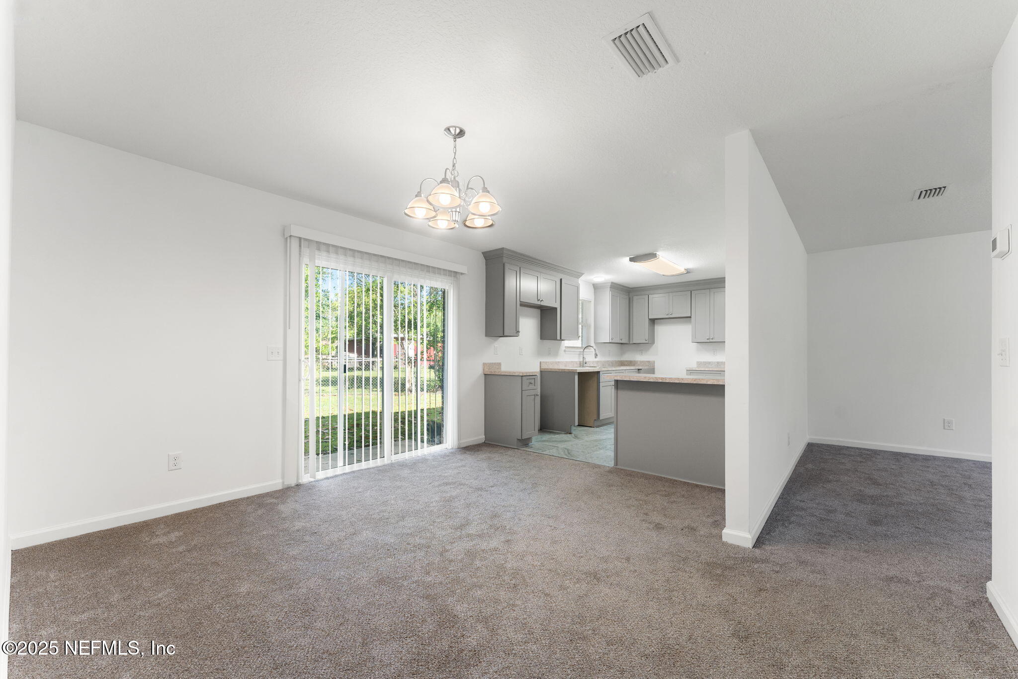 4906 Chivalry Drive Jacksonville, FL 32208 - Photo 9 of 17 Kitchen and Dinning room