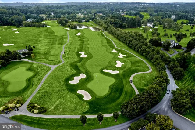 a view of a golf course with a yard