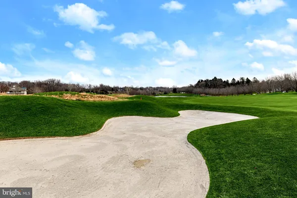 a view of a golf course with a garden