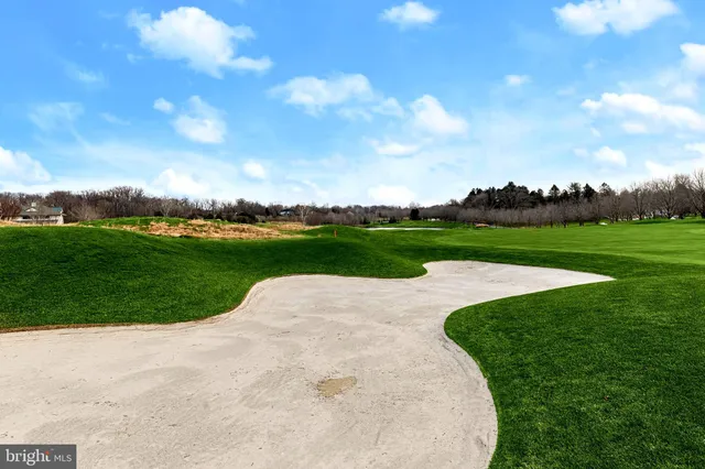 a view of a golf course with a garden