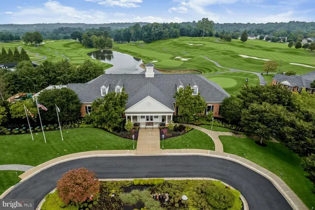 an aerial view of a house with a garden