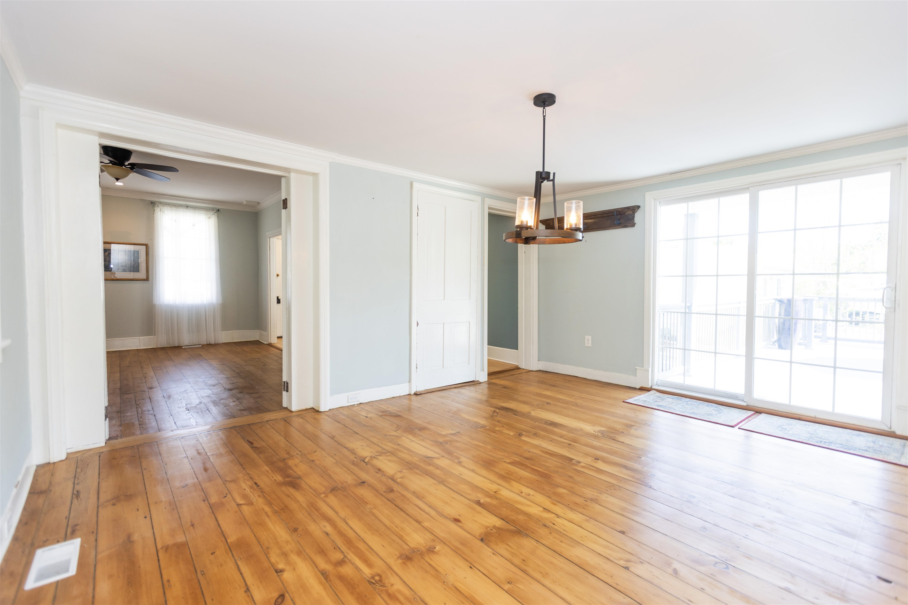 837 Seashore Road Cape May, NJ 08204 - Photo 10 of 47 a view of empty room with wooden floor and fan