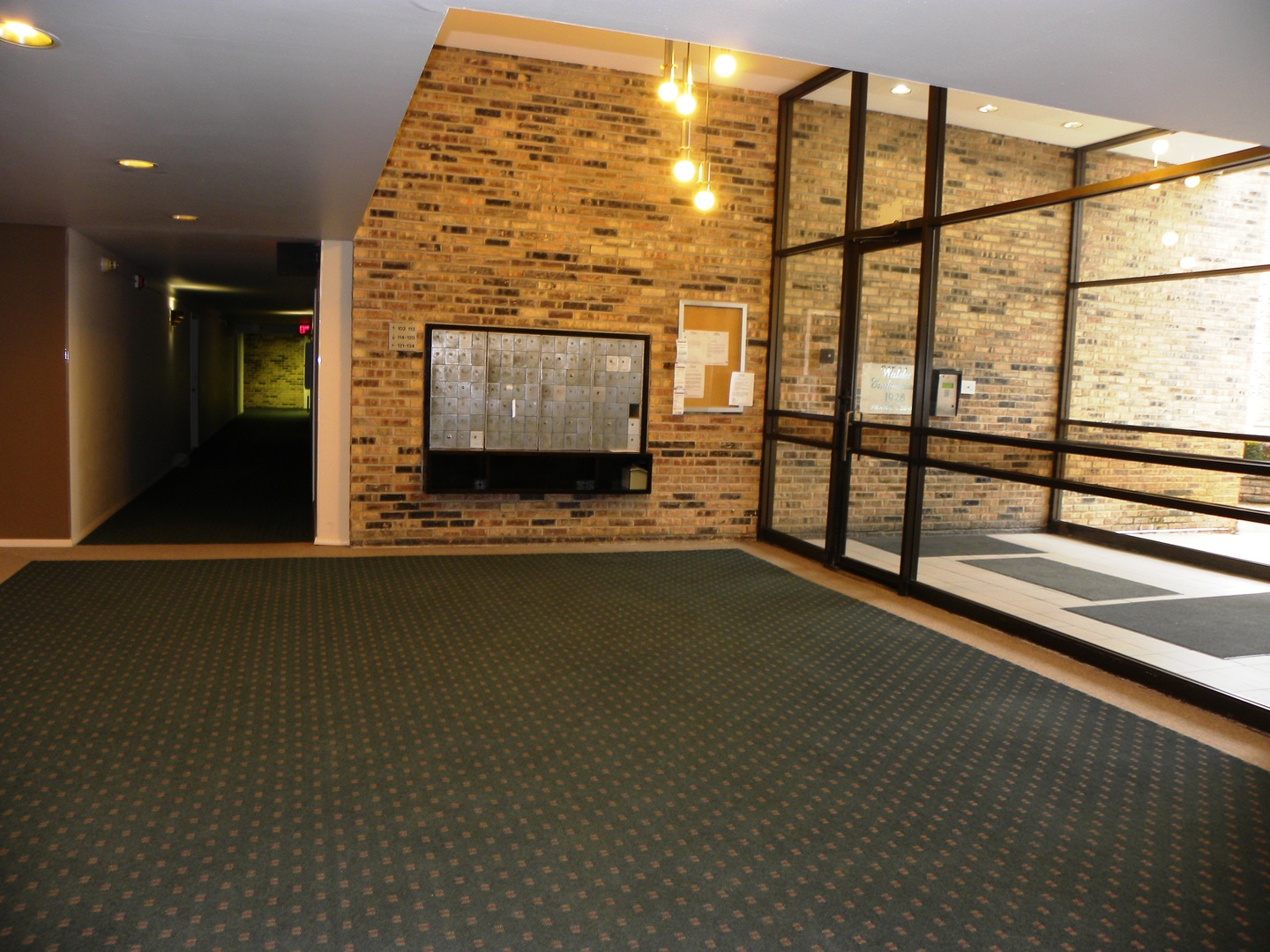 1931 Prairie Square, Unit 308 Schaumburg, IL 60173 - Photo 2 of 11 a view of room with window and wooden floor