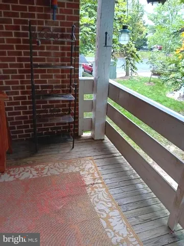 a view of outdoor space and wooden shelves