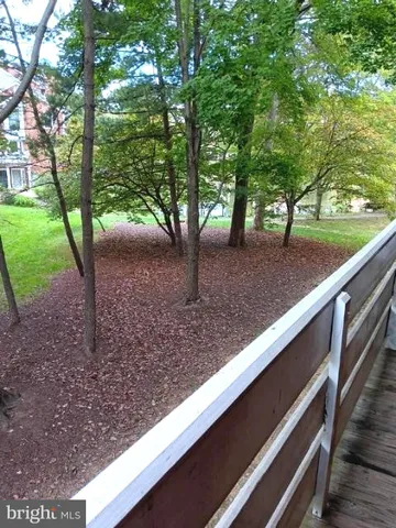 a view of swimming pool with seating space
