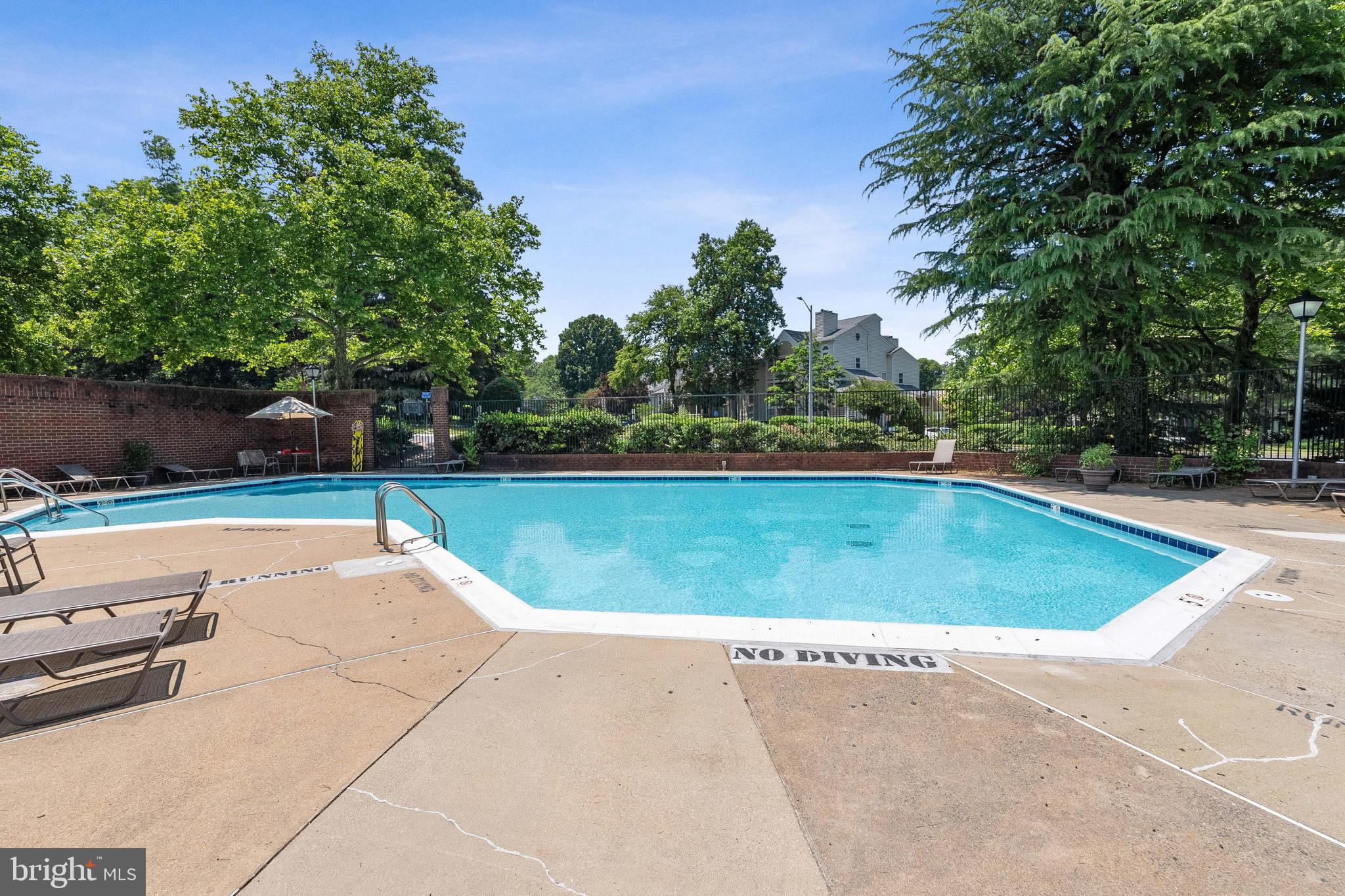 3152 B Covewood Court Falls Church, VA 22042 - Photo 16 of 26 a view of swimming pool with seating space