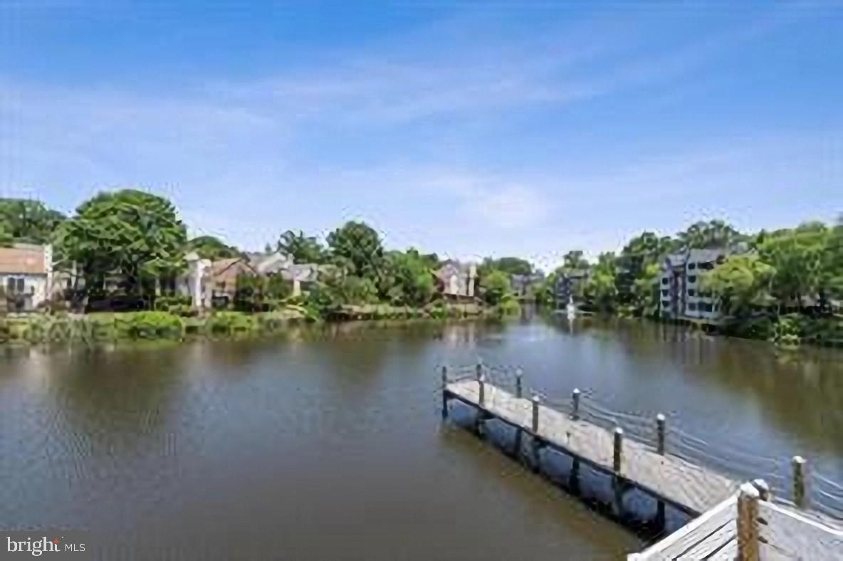 3152 B Covewood Court Falls Church, VA 22042 - Photo 21 of 26 a view of a lake with houses