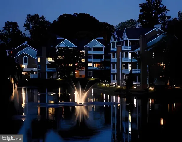 a view of a cars parked in front of a building