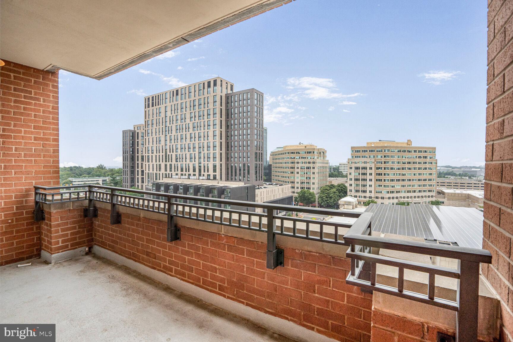 1830 Fountain Drive, Unit 1106 Reston, VA 20190 - Photo 27 of 30 a view of city with balcony