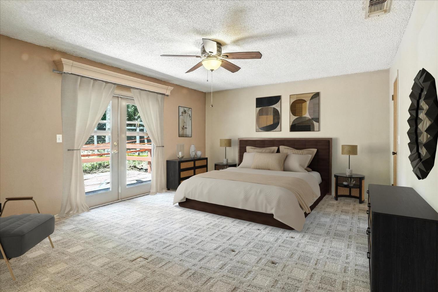 5783 Chowchilla Mountain Road Mariposa, CA 95338 - Photo 33 of 43 a spacious bedroom with a large bed and a chandelier
