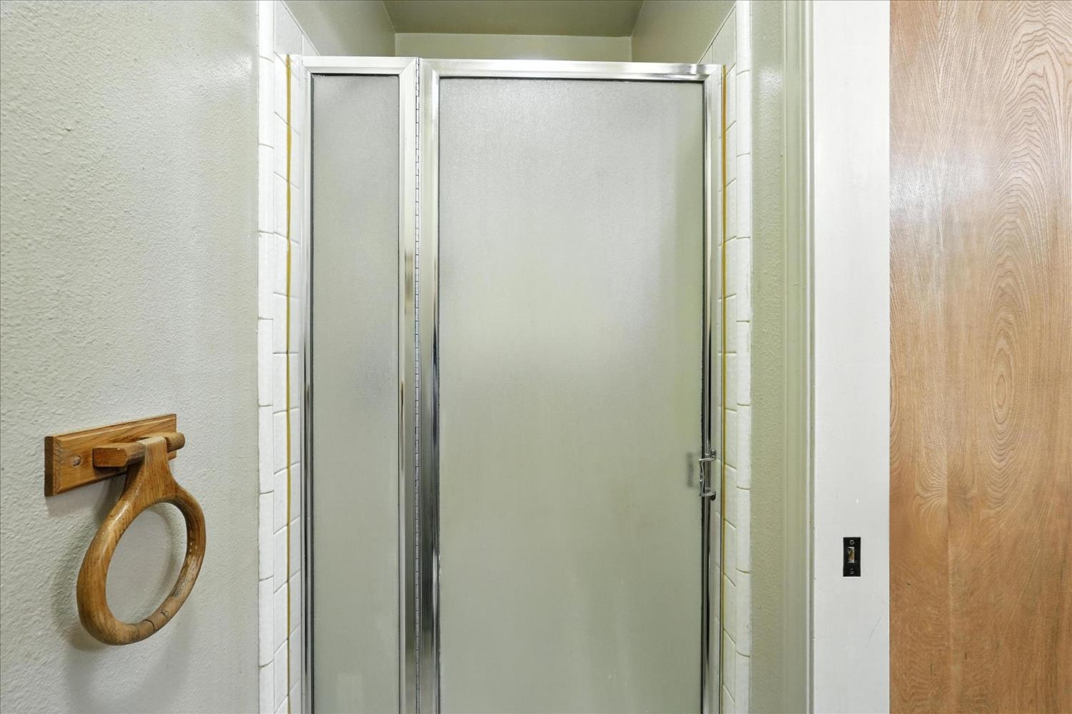 5783 Chowchilla Mountain Road Mariposa, CA 95338 - Photo 37 of 43 a bathroom with a shower and a mirror