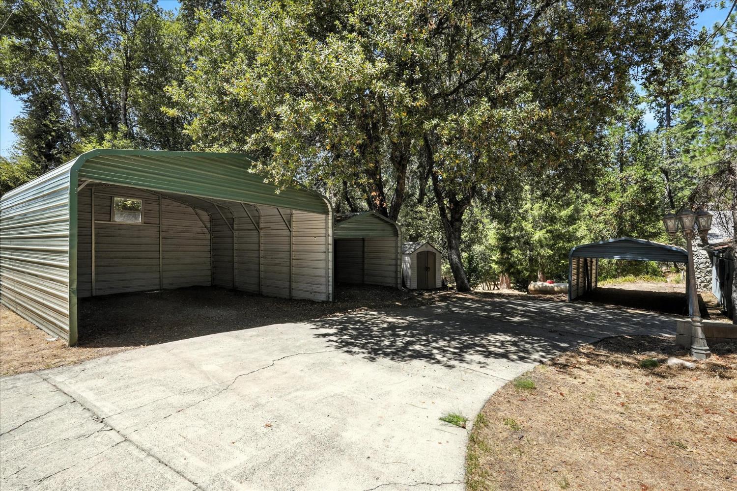 5783 Chowchilla Mountain Road Mariposa, CA 95338 - Photo 38 of 43 Three carports provide covered parking.