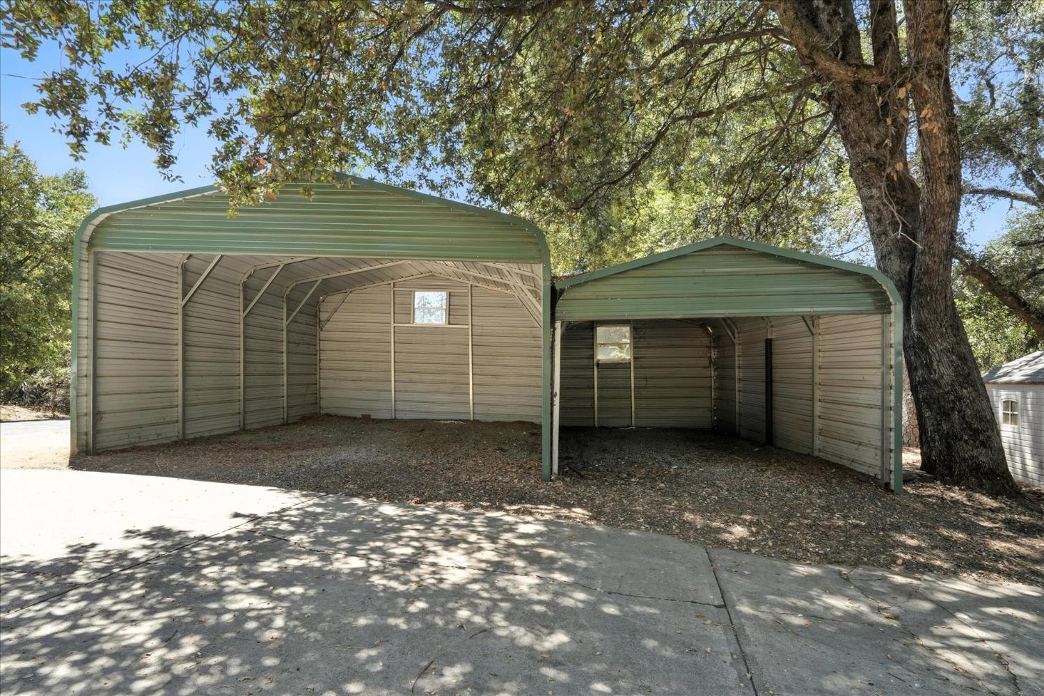 5783 Chowchilla Mountain Road Mariposa, CA 95338 - Photo 39 of 43 a view of a house with a yard
