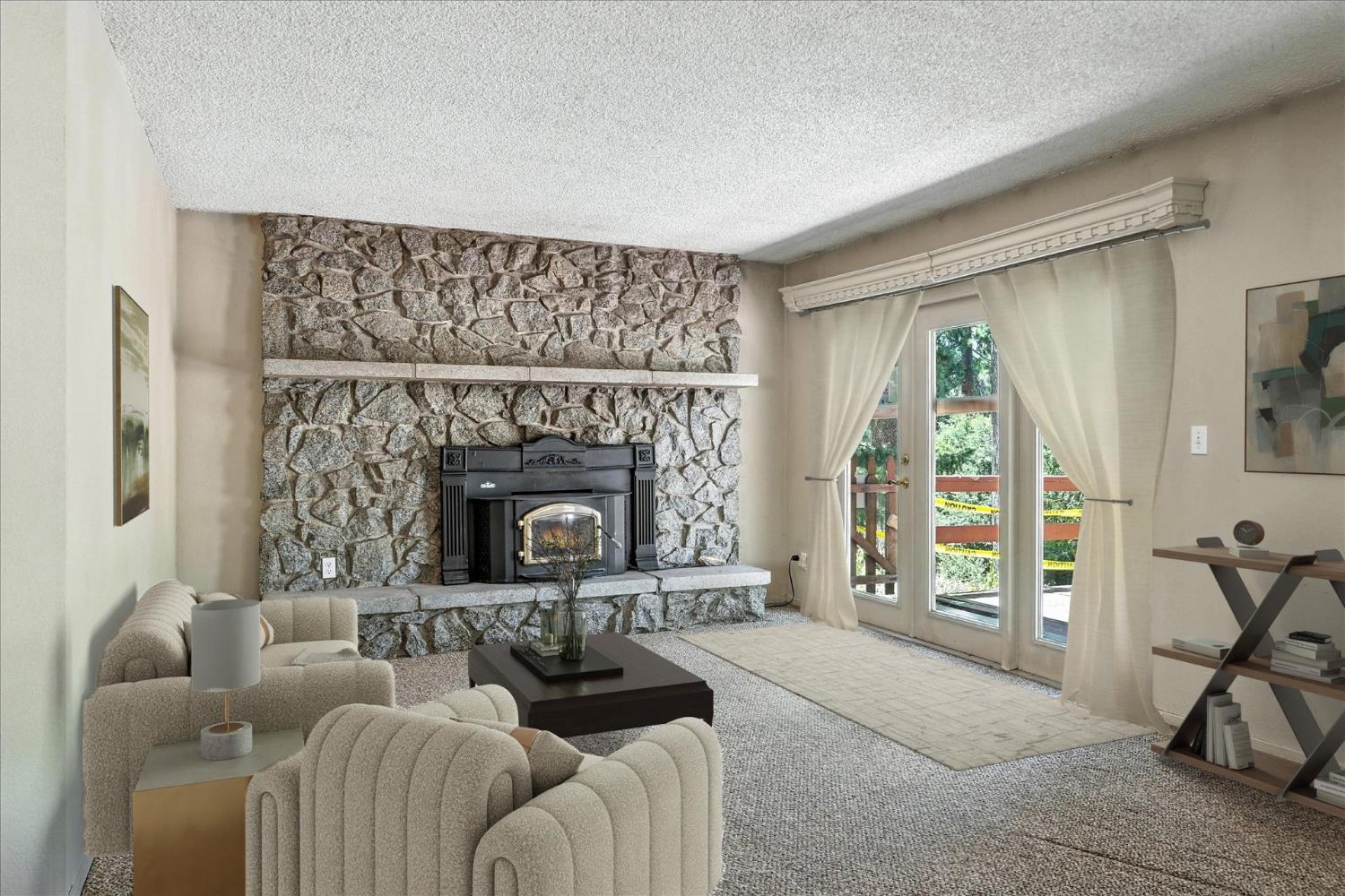 5783 Chowchilla Mountain Road Mariposa, CA 95338 - Photo 10 of 43 a living room with furniture and a fireplace