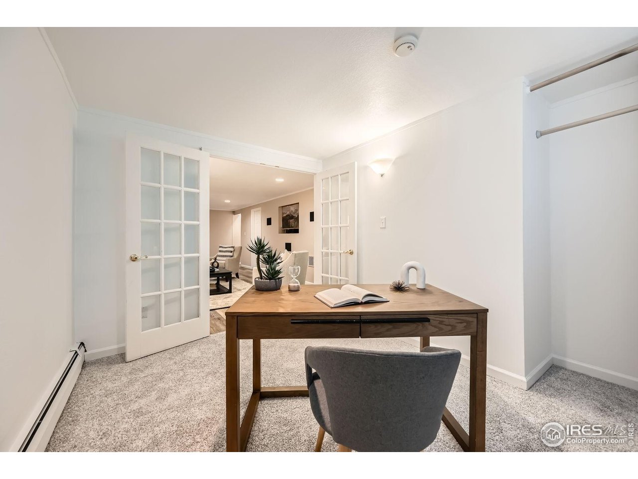 5604 Bowron Place Longmont, CO 80503 - Photo 13 of 37 a dining room with a table and chairs