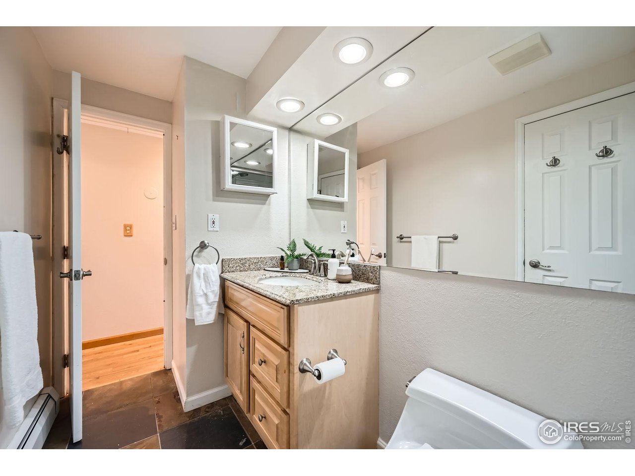 5604 Bowron Place Longmont, CO 80503 - Photo 17 of 37 a kitchen with sink and cabinets