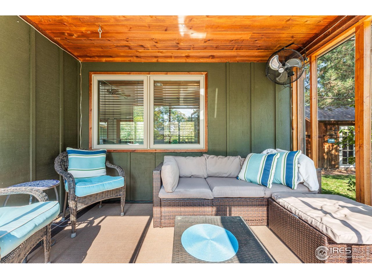 5604 Bowron Place Longmont, CO 80503 - Photo 29 of 37 a view of a couch in a porch